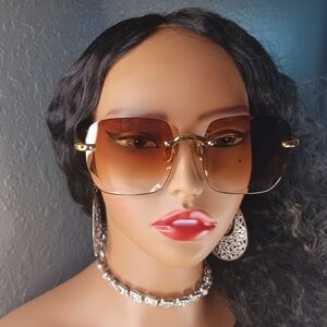 Rimless Brown and Gold Sunglasses.